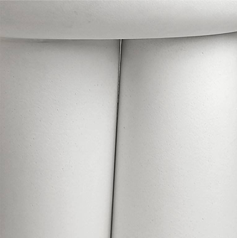 FEMME sculptural side table in white cast stone by Alentes Atelier